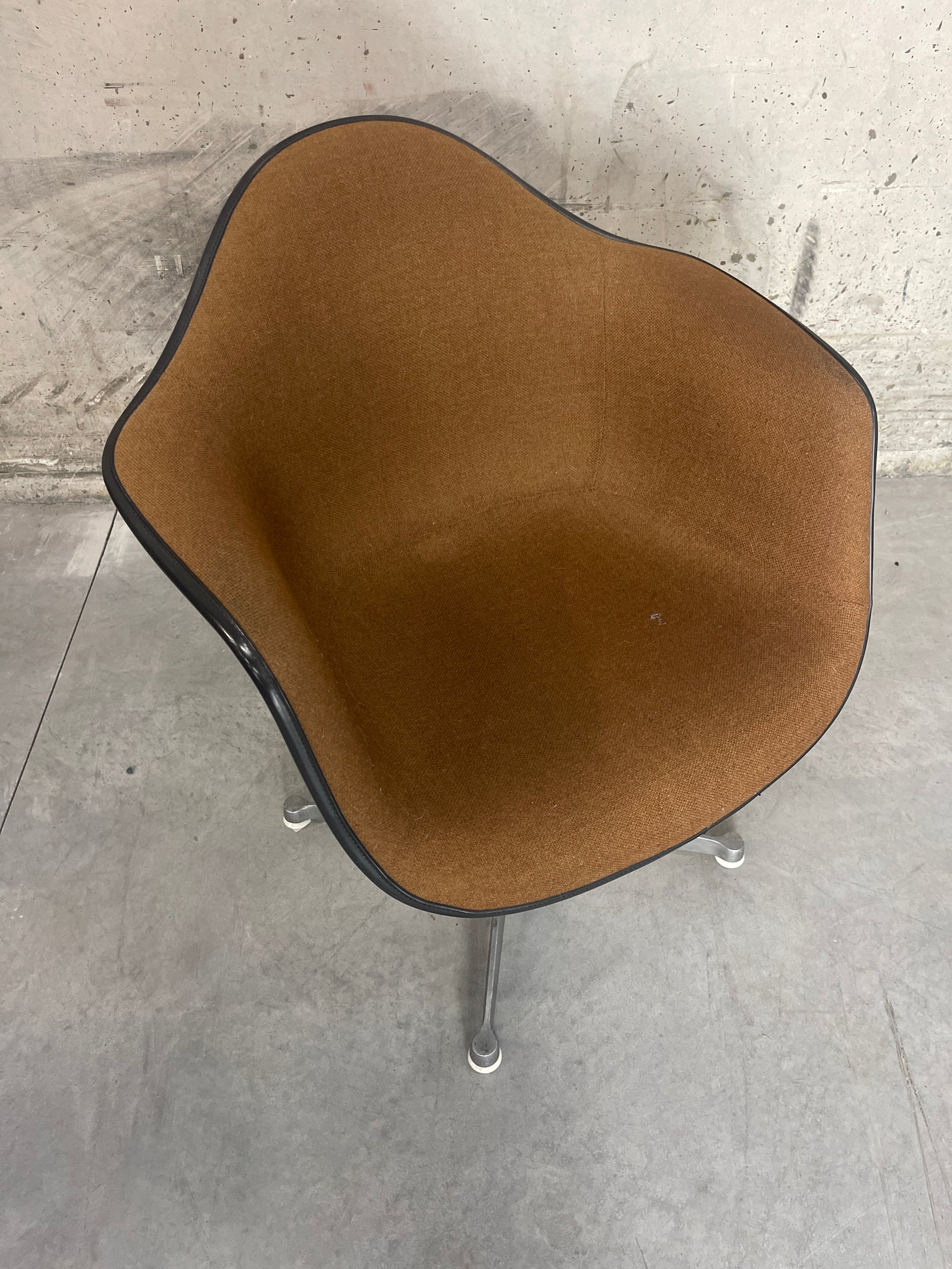 Eames fiberglass shell armchair