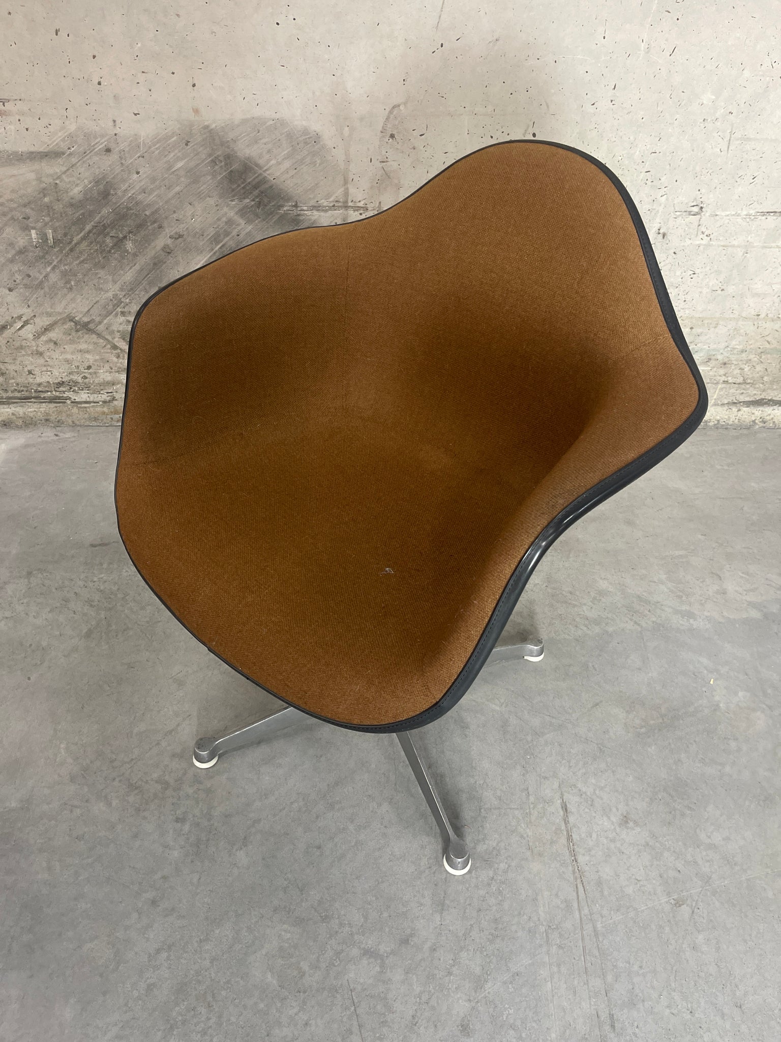 Eames fiberglass shell armchair