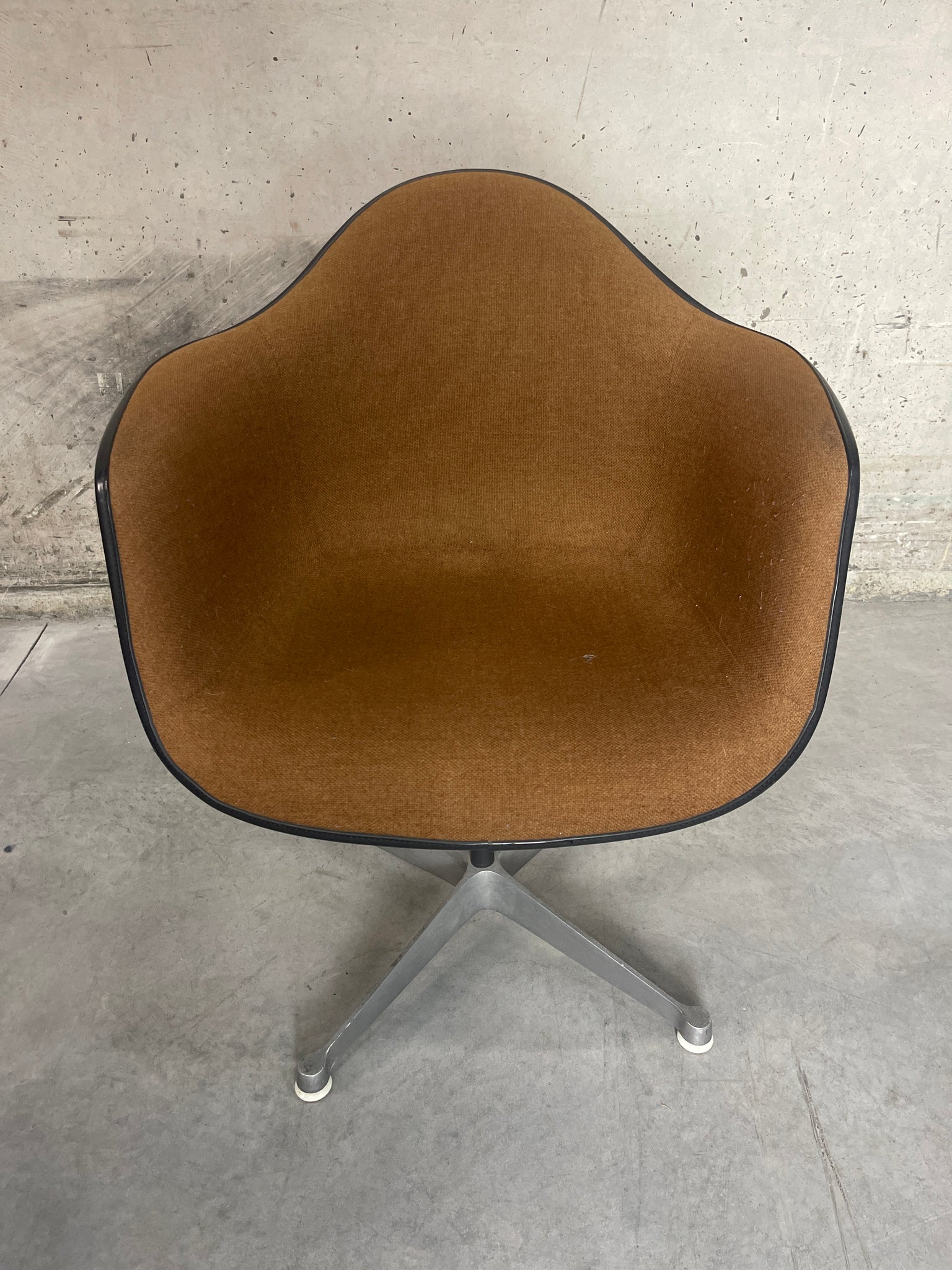 Eames fiberglass shell armchair